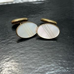 Vintage Mother of Pearl oval cuff links with double carved stripe